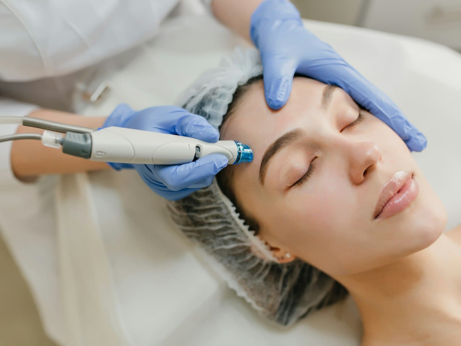 Client receiving a professional facial treatment at a med spa